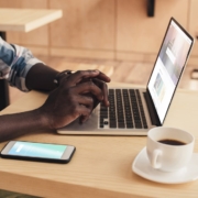 african-american-male-looking-at-laptop