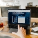 restaurant-worker-looking-at-computer-screen
