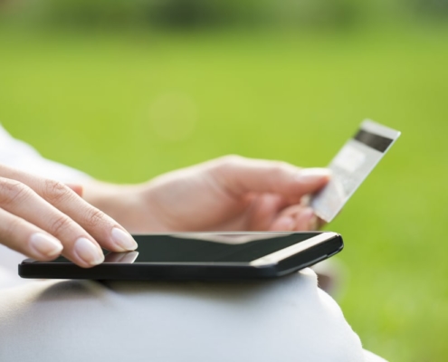 person-using-gift-card-on-mobile-device