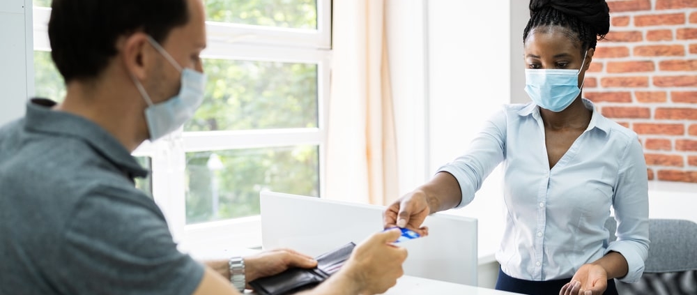 Customer-checking-out-with-clerk
