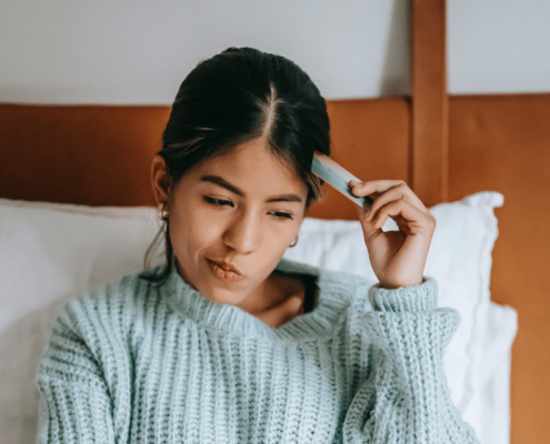 woman-looking-at-computer-making-purchase-choice