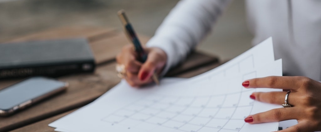 female-professional-making-a-checklist