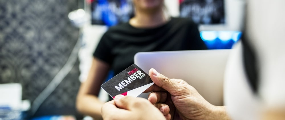 Person looking at gift card before paying