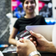 Person looking at gift card before paying