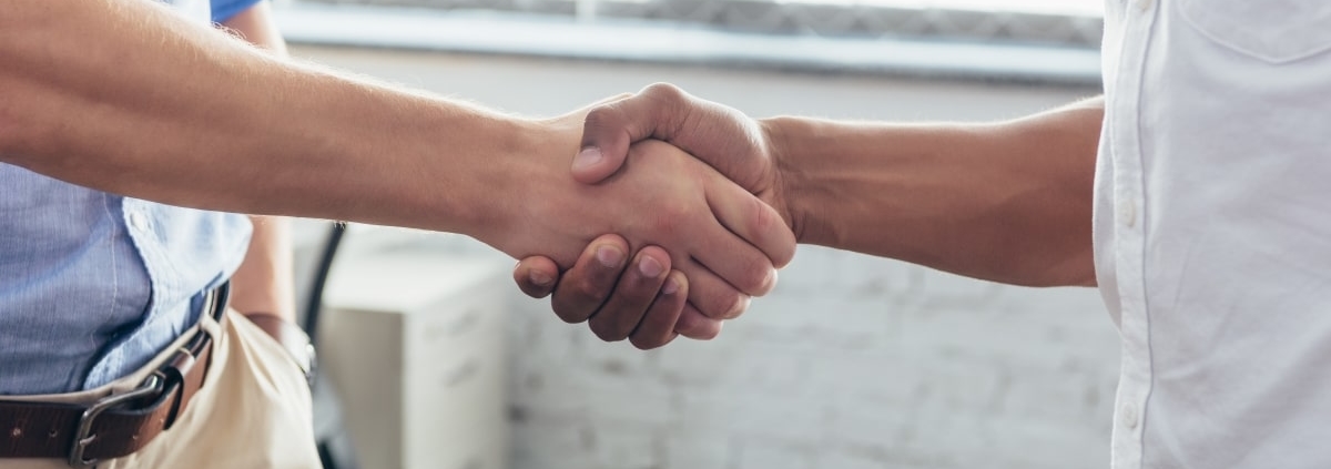Two people shaking hands
